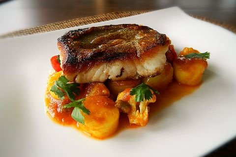 Pan-fried Pacific cod on curried potatoes and cauliflower
